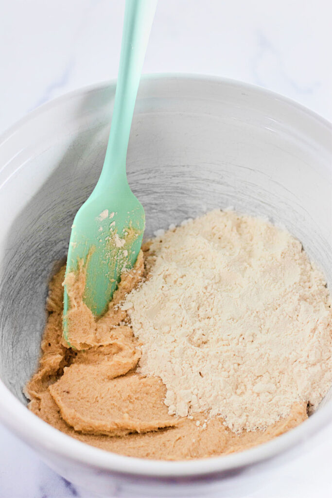 The flour was added to the mixture.